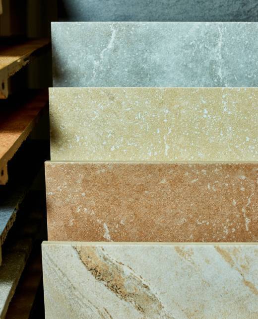 Various decorative tiles samples. Colorful samples of a stone tile in store. Copy space.